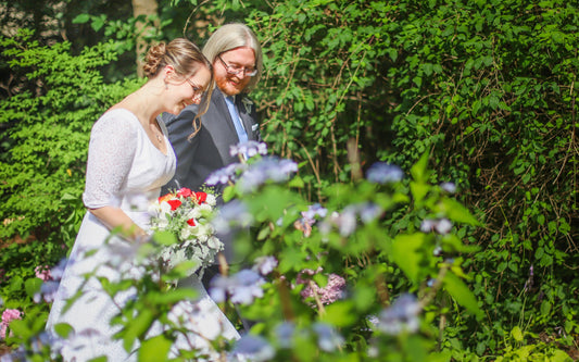 bride and groom walking down the path after the wedding ceremony