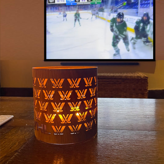 My PWHL candle lantern on the coffee table while watching the game- size medium White Oak - the perfect PWHL fan gear for the PWHL fan in your life