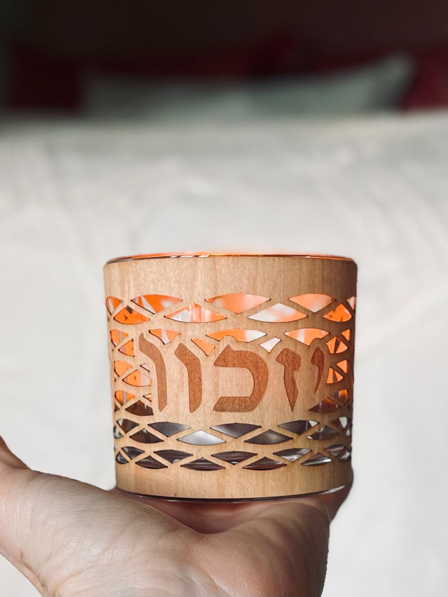 Yahrzeit/Yizkor memorial candle holder in a sleek, modern glass and wood design.