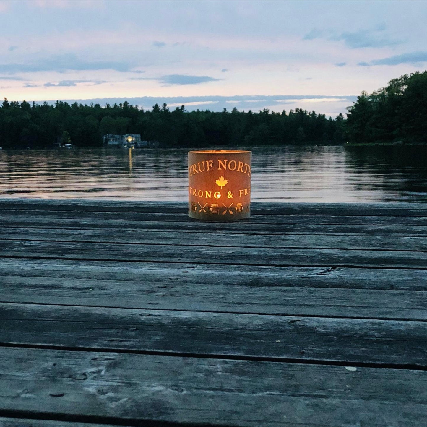 a true north lantern in medium White Oak on a deck by Memphremagog