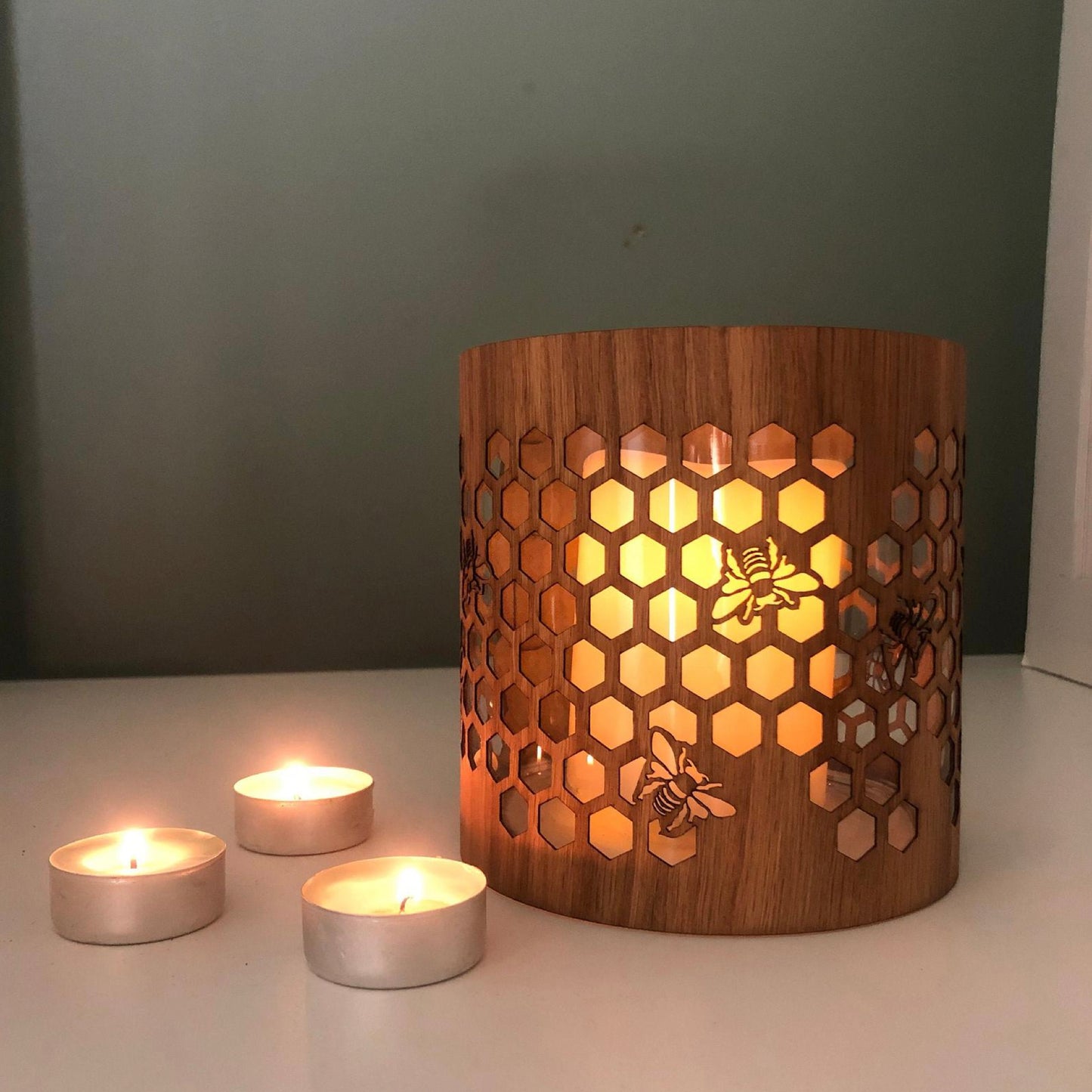 medium White Oak honeybee lantern with some tea lights for scale