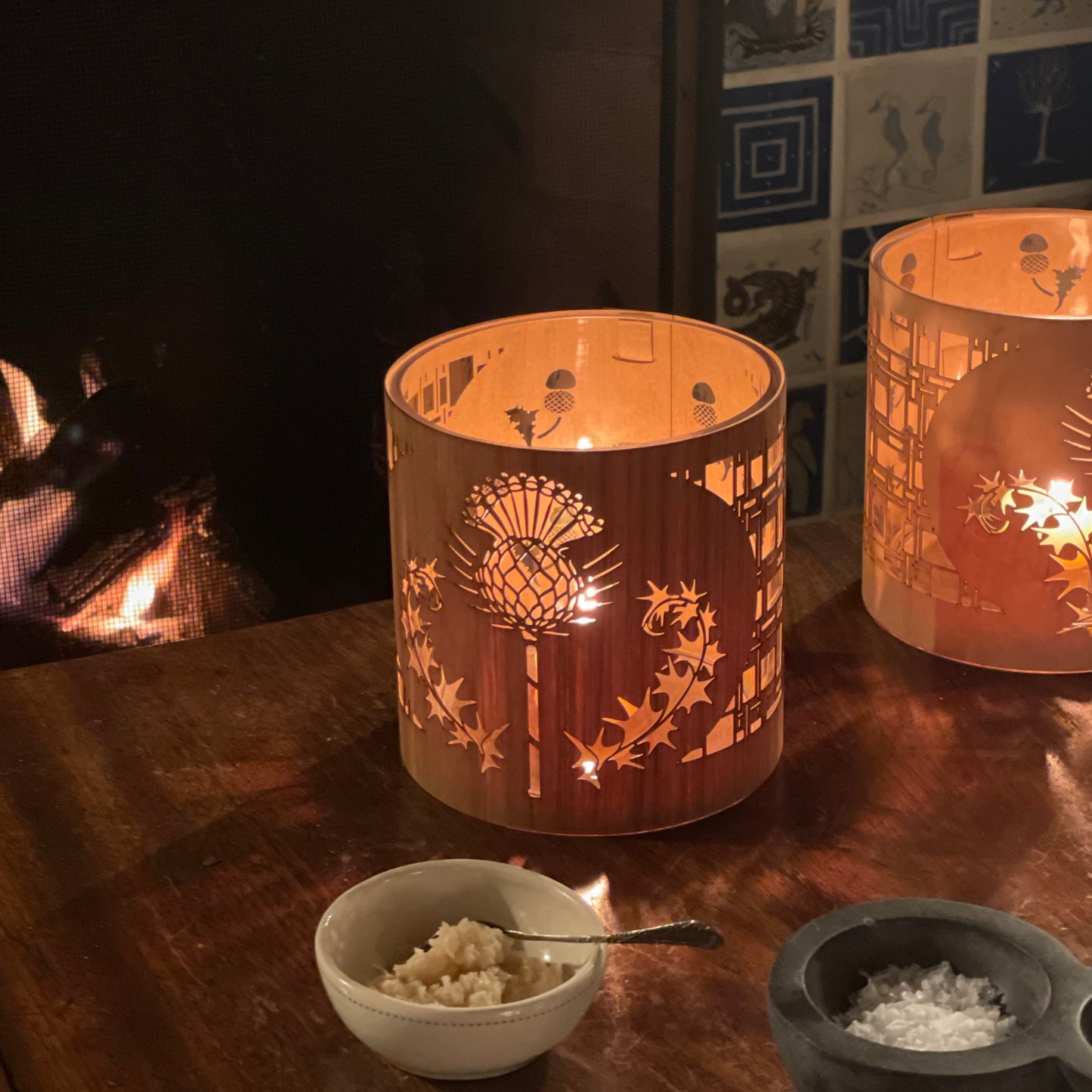 thistle art lantern in medium white oak lantern cozy- a prototype in maple behind