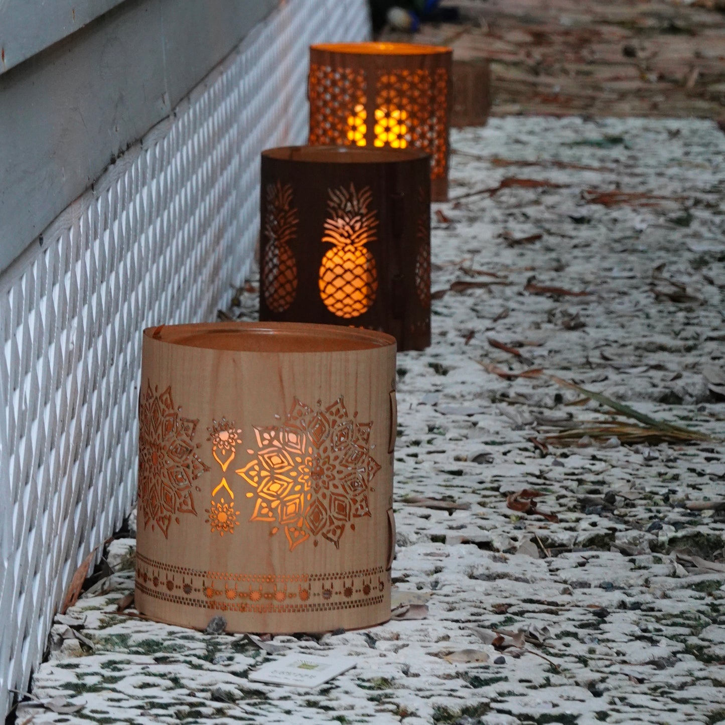 large maple mandala lantern on the pathway beside a house on curry lane key west florida