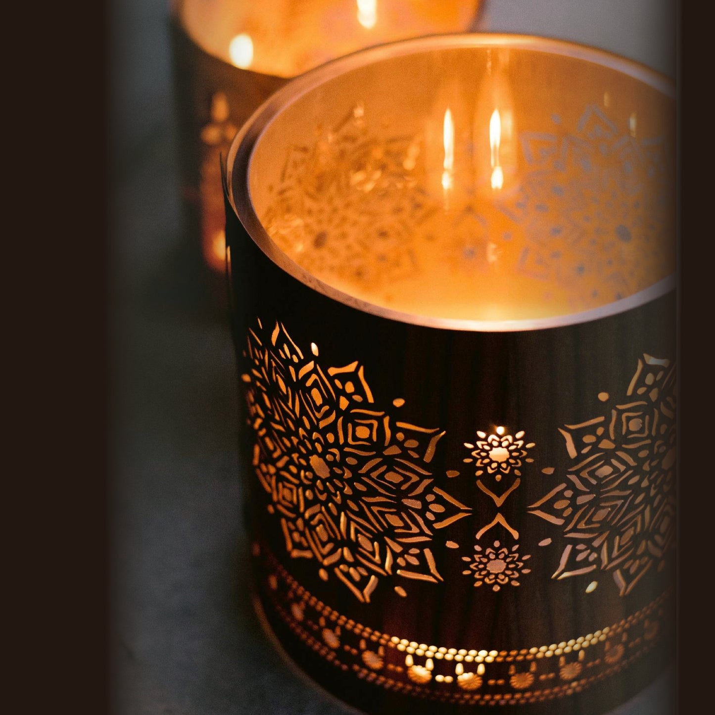 small walnut mandala lantern lit on an august evening