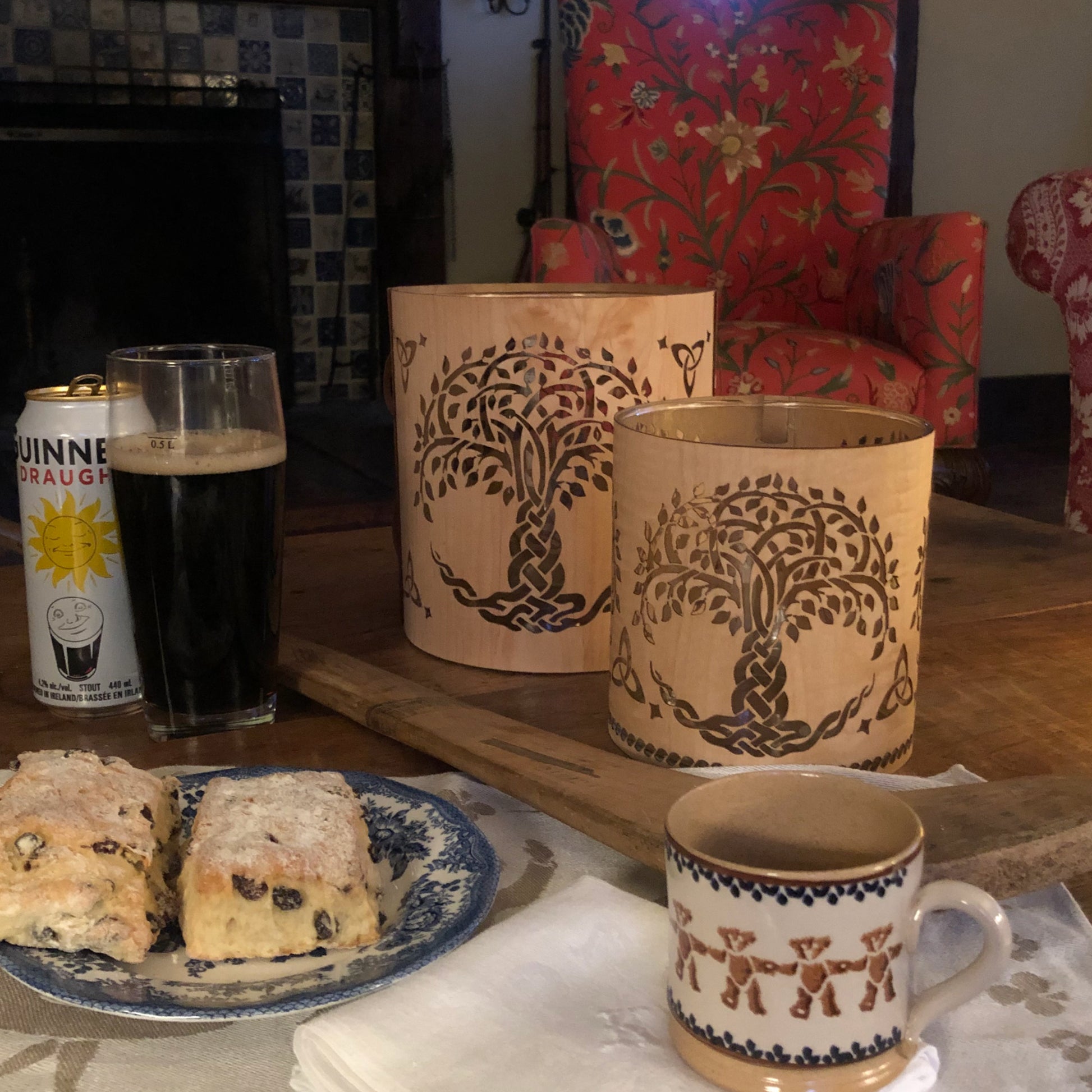 a large and a medium tree of life lantern a guess two scones and a Nicolas Mosse mug